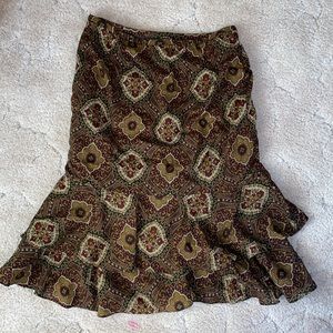 Ann Taylor floral skirt fits like a 4 says 2